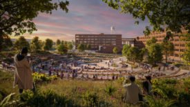 Rendering of a park-like landscape next to industrial buildings