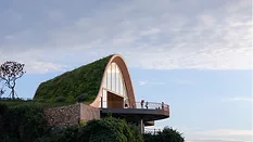 Arched, earth-covered pavilion 