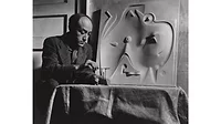 Isamu Noguchi with model for Contoured Playground, c. 1946. The Noguchi Museum Archives, 03775.