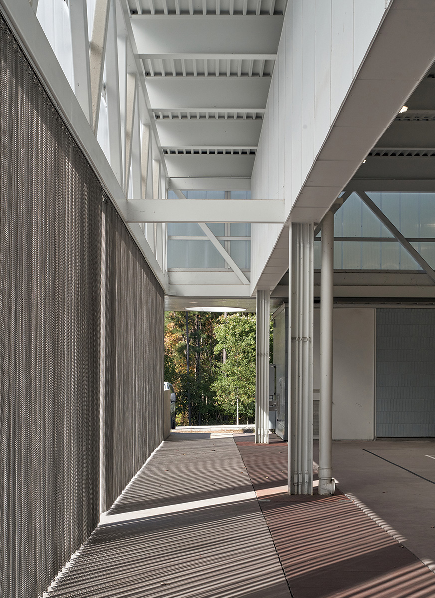 Structural steel and translucent polycarbonate pavilion detail.