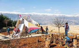 The playground in Qaraoun frames views of Mount Lebanon.