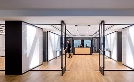 The crisply Miesian reception and exhibition area of NYU&rsquo;s Special Collections Library.