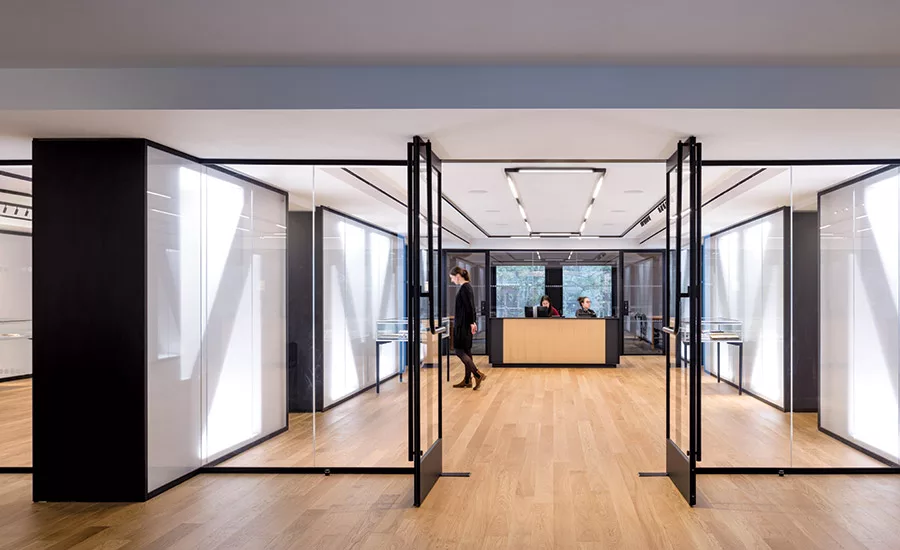 The crisply Miesian reception and exhibition area of NYU’s Special Collections Library.