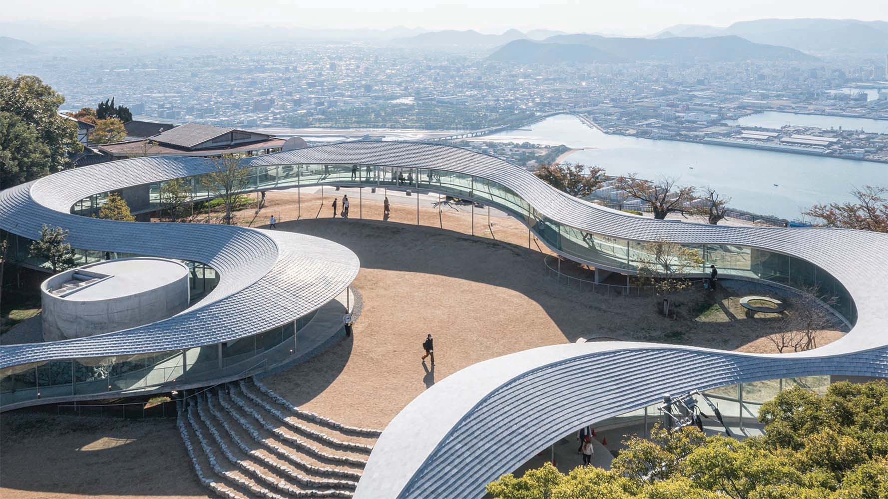 Takashi Suo's Sinuous Pavilion Snakes Around its Mountaintop Site in Japan