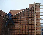 In Canada, A Rammed-Earth Wall for the Ages