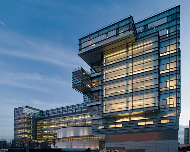 Next to the Van Wyck Expressway in Queens, the architect's revamp of a maintenance and refueling station for Department of Transportation vehicles includes a monitoring station with a shape and facade