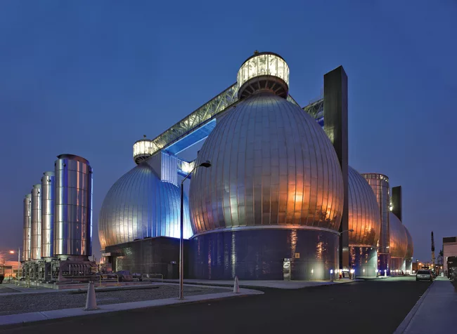 Working for the Department of Environmental Protection, Ennead wrapped this facility's 'digester eggs' in stainless steel. At night, they look almost too glamorous for their function, processing waste