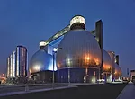Working for the Department of Environmental Protection, Ennead wrapped this facility's 'digester eggs' in stainless steel. At night, they look almost too glamorous for their function, processing waste