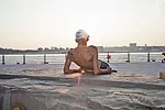 A man lounges near Hudson River Park&rsquo;s pedestrian path. The waterside park extends from Battery Park to 59th Street. The first section opened in 2003 and the five-mile stretch of greenery is now
