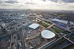 Clockwise, from top: The Olympic Stadium, Velodrome, Basketball Arena, Athletes' Village, and Aquatics Centre