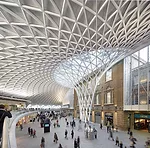 John McAslan + Partners master planned the King's Cross Station redevelopment, which includes reuse, renovation, and new construction. The centerpiece is the Western Concourse, which opened in March a