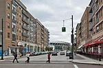 Residential buildings with ground-level retail space and restaurants have started going up between Cincinati's riverfront stadiums. The development, named 'the Banks,' will someday comprise 300 apartm