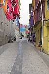 The wide, paved walkway and painted houses in this section of Rio's most populous favela, Rocinha, are the result of the federally funded Growth Acceleration Program, which entered its second phas