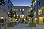 The sustainable complex, completed in 2009 for Resources for Community Development, includes two courtyards and a day-care center.