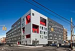 While Le Corbusier's towers-in-the-park idea didn't fare well in the U.S., Alexander Gorlin Architects returned to the master's low-rise housing schemes for the Brook, a si