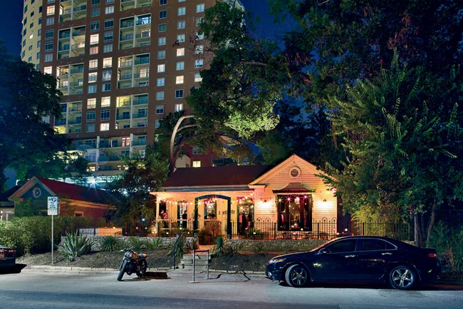 A neighborhood of historic houses along Rainey Street, on the edge of downtown Austin, developed into an overflowing strip of bars and restaurants in just a few years. Now new apartment towers are ris