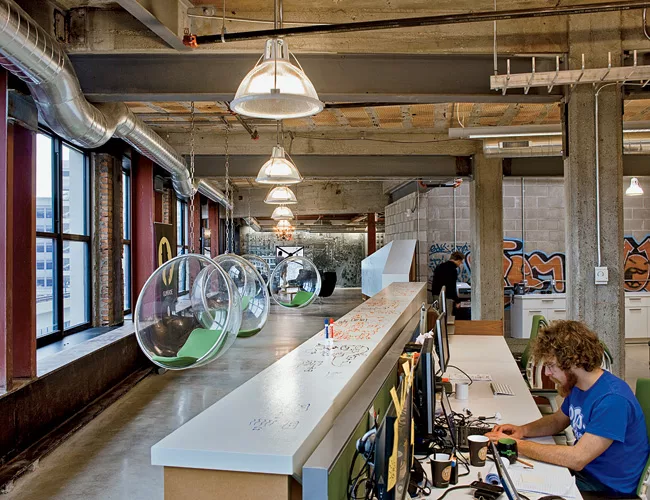 Young tech professionals are making their way to Detroit, working in newly renovated early 20th-century buildings such as the M@dison.