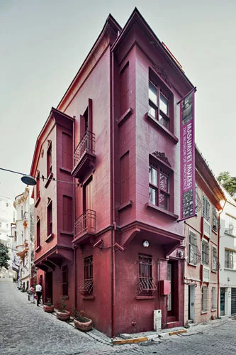 Painted an aching blood red, the Museum of Innocence stands out in its gentrified but still scruffy neighborhood.