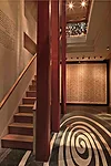Rising above the entry, an atrium allows simultaneous views of the museum's displays.