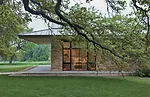Deep overhangs create porches on all sides.