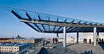 A rooftop terrace and amphitheater for small-scale summer performances offer  spectacular city views.
