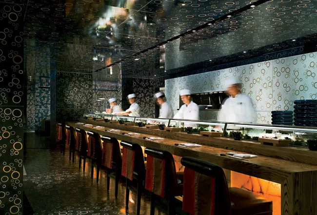  The Rockwell Group brings a similar brand of theatricality to its restaurants, including Nobu Fifty Seven (left, 2005), where it pairs with design-driven platings.