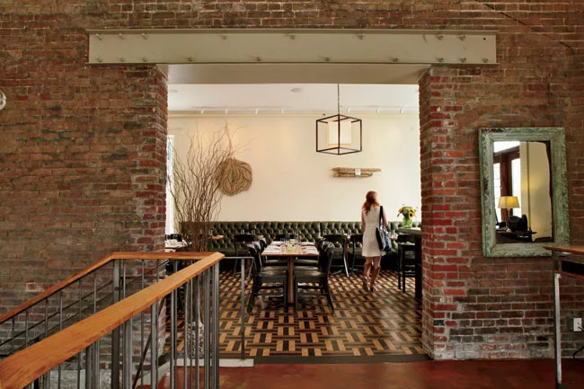 Craft Conscious: Rough materials and rustic finishes dominate contemporary projects, including Tucker Booker Donhoff + Partners Garage Bar (2011) and Decca (left, 2012), both in Louisville.