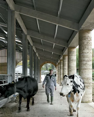 Designed by London-based Stephen Taylor Architects, this comely cowshed —part of Shatwell Farm on the Hadspen Estate near Castle Cary in Somerset, England—is the first phase of the his