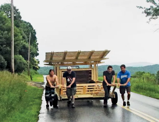 Rolling Pig Pen is the creation of Studio North, a six-day design-build program held on a farm in Norwich, Vermont, and led by Boston architects Moskow Linn. Made of standard pine framing stoc