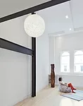 Reddy rid the space of awkward details such as wall niches, exposing select beams and columns she coated with intumescent paint.