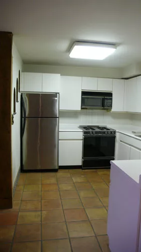 Before photo: Kitchen prior to renovation of East 12th Street apartment