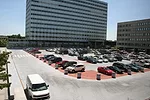 View of visitors parking lot and Building 220 before renovation project.