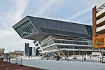Angled at 35 degrees, Zaha Hadid’s 300,000-square-foot library and Learning Center asserts itself on the central square.