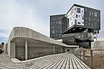 Eduardo Arroyo’s firm NO.MAD stacked a group of boxes for its Executive Academy in the northwest corner of the campus.