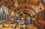 Hearst wanted his own office and library, so Morgan designed the Gothic Study (1931) on the main house's third floor. The ceiling combines 15th-century Spanish beams with arches designed in the Gothic