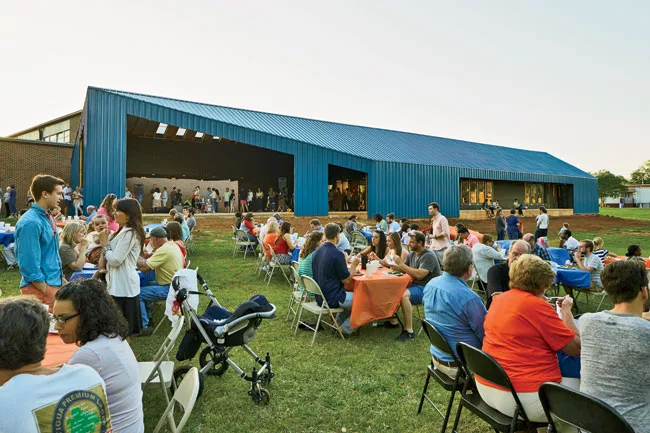 The Greensboro Boys &amp; Girls Club was one of a dozen projects presented over the course of the weekend. Clad in a brightly hued corrugated metal, it refers to the vernacular rural barn.