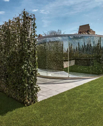 For decades, Dan Graham has created pavilions that play with viewers’ perceptions of space. His <em>Hedge Two-Way Mirror Walkabout</em>, 2014, a collaboration with the Swiss landscape architect