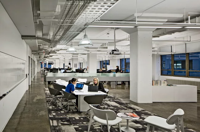 In 2013, Perkins + Will used benching—desks arranged like conference tables—for the New York offices of Vente Privée USA, a joint partnership of the French online fashion retailer and