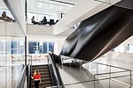 STUDIOS created an internal stairway of fiberglass to connect the reception, café, and conference areas for Intercontinental Exchange (ICE) in New York in 2013. The fluid, organic feature dramati