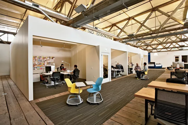 Jensen Architects carved niches for offices and meetings, plus inserted private phone booths in a barlike structure for the San Francisco offices of IDEO, a design firm. Completed in 2012, offices occ