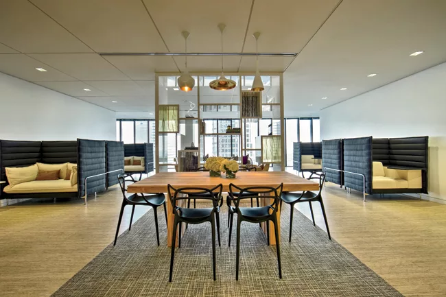 For the law offices of Seyfarth Shaw in Houston (2014), the Rottet Studio designed lounges to function as meeting or study spaces, since the firm does not have a library. The high-backed settees allow