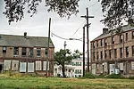 After Hurricane Katrina, the city's stock of public housing was cut by more than two thirds, as projects'damaged or not'began to be redeveloped into mixed-income communities. The new developments, bas