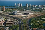 The raised floor plate of Christian de Portzamparc’s Cidade das Artes lifts its public spaces higher than a busy traffic interchange in Rio’s sprawling Barra district, affording views to t