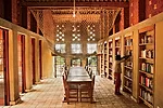 A large hammock woven from sisal grown on the site, accessed by ladder, animates the library and provides a  fun place where kids can curl up with a book.