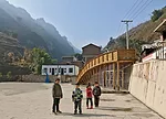 The architects used an existing public plaza and retaining wall as key elements in their design.