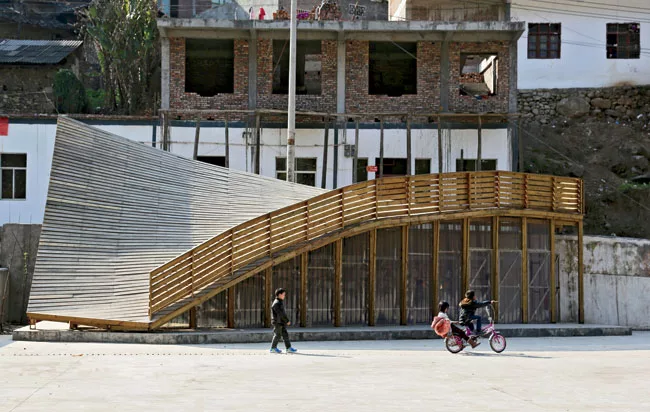While most new construction in the rebuilt village relies on concrete, the Pinch shows the continuing relevance of the area's traditional wood architecture.
