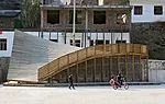 While most new construction in the rebuilt village relies on concrete, the Pinch shows the continuing relevance of the area's traditional wood architecture.