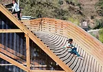 Sliding down the roof.
