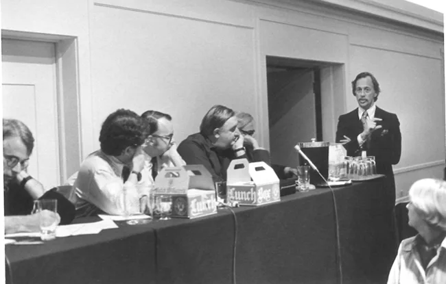 The State of Art of Architecture symposium at the Graham Foundation, Chicago, October 1977; Timothy Vreeland, standing, James Stirling center.