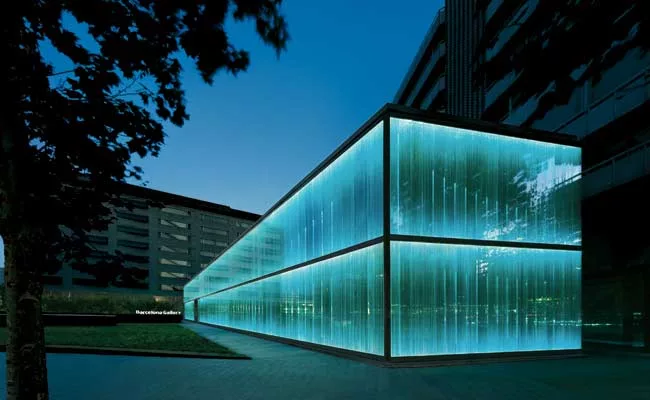 A system of 4,200 computer-controlled LEDs illuminate the Roca Barcelona Gallery at night.